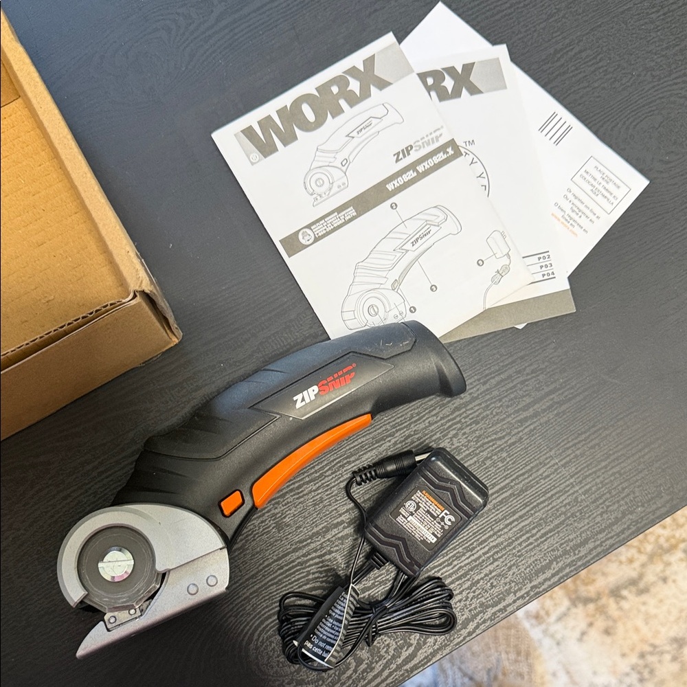 WORX ZIPSnip Cordless Mini Saw in Black and Orange